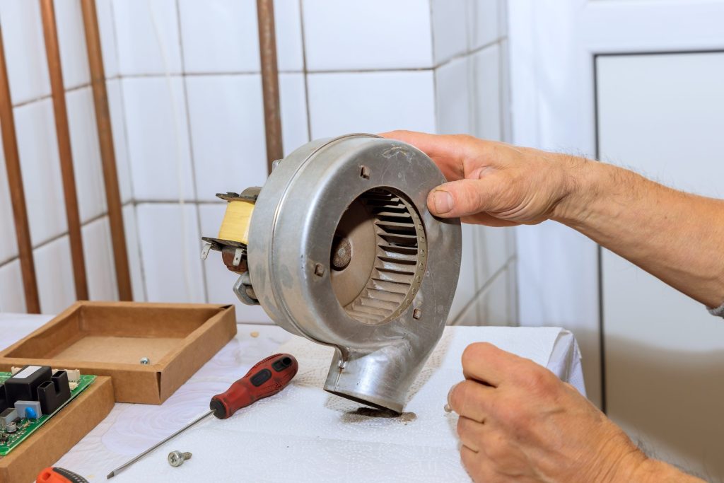 The blower wheel and housing out of a hood.