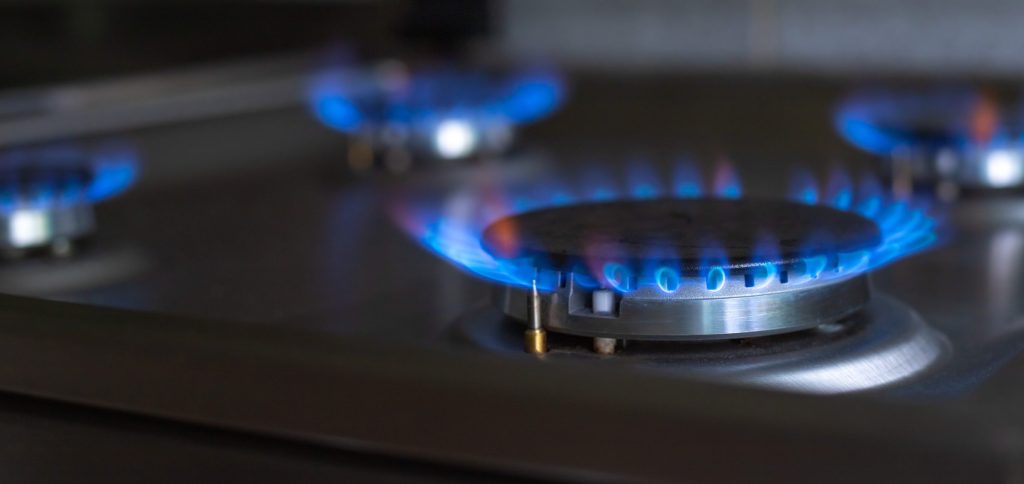 A burner with its cap off and the spark electrode exposed