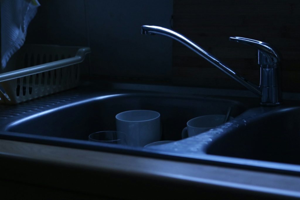 Standing water in a dishwasher tub